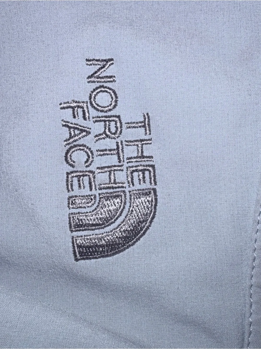 The North Face Women's White Softshell Jacket with Light Gray Fleece Lining